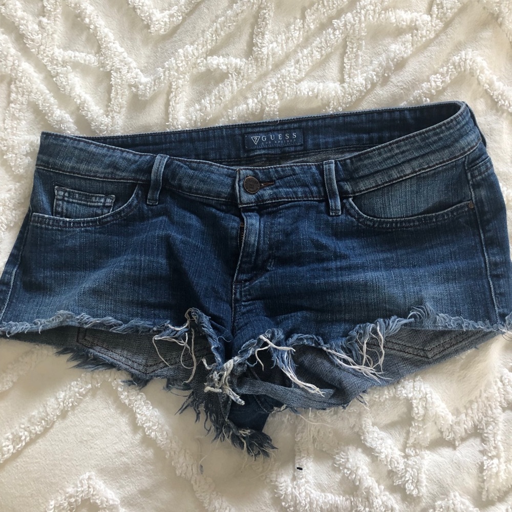 Guess low rise jean shorts size 30 distressed